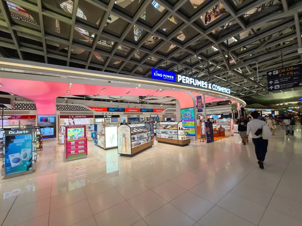 Explore perfume and cosmetics shops in Bangkok Airport.