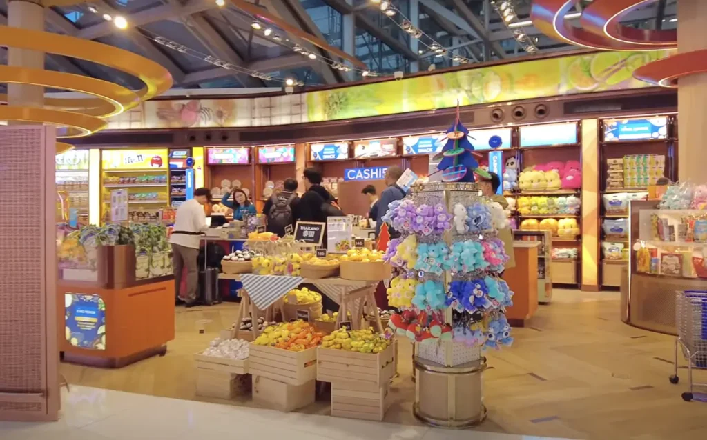 Duty-free shop in Bangkok Airport's main terminal offering tax-free luxury goods.